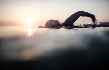 Portrait of a determined male swimmer in action